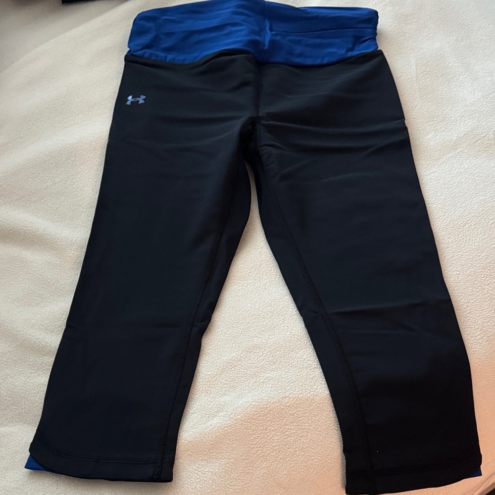 Under Armour cropped leggings in black with blue waistband